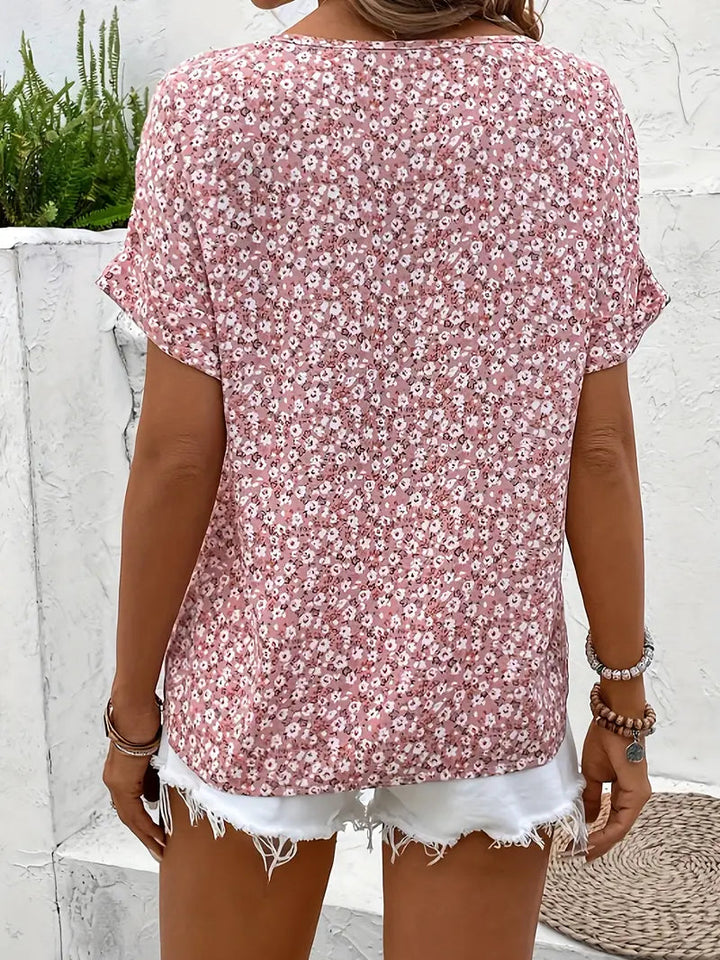 Amira | Luftige Bluse mit Blumenmuster & Holzknopf-Details
